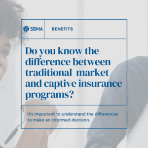 What is the difference between standard market insurance programs and captive insurance programs?